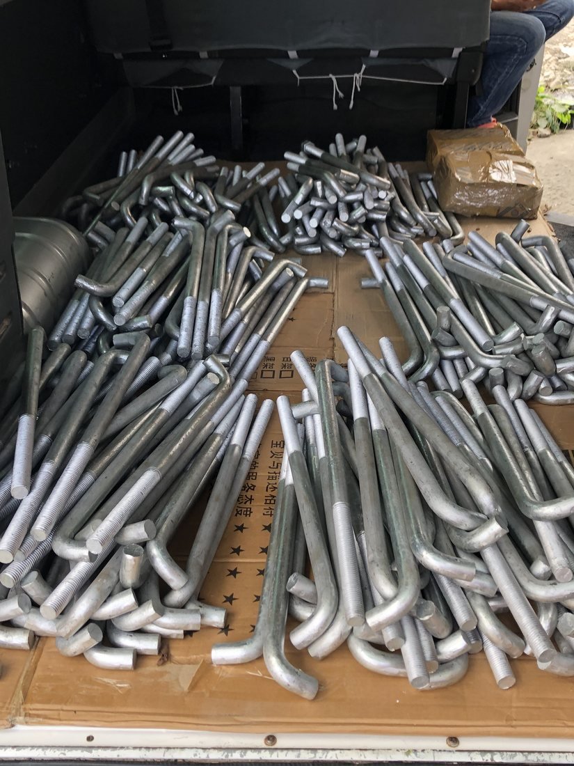Hot-dip galvanized L-shaped anchor bolts fanned out — Southend