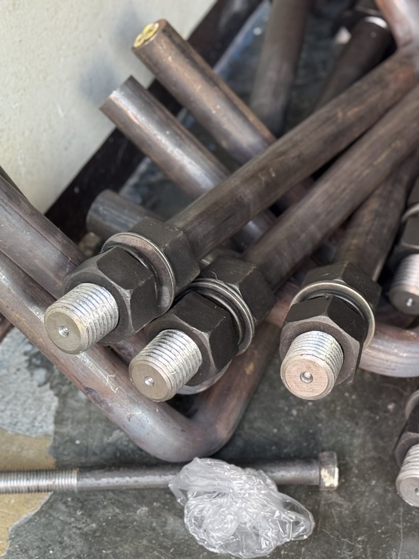 Headed anchor bolt with nut and washer, close up — Southend