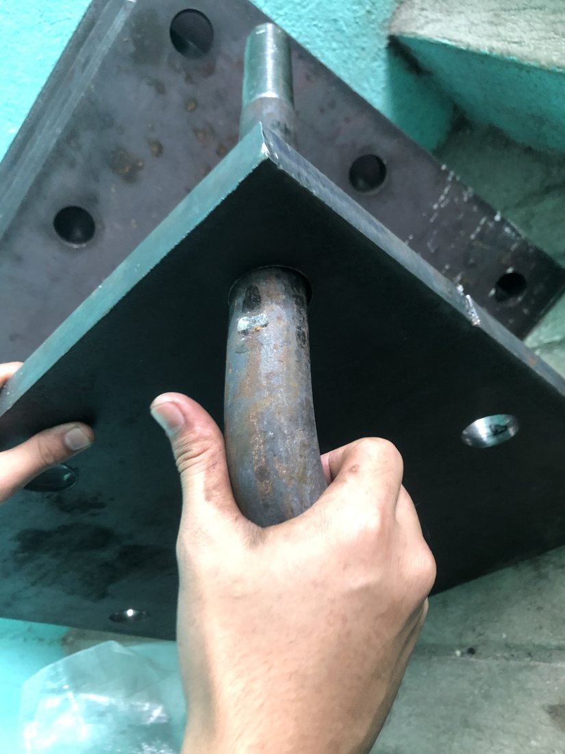 Multi-hole steel base plate with bent anchor bar — Southend